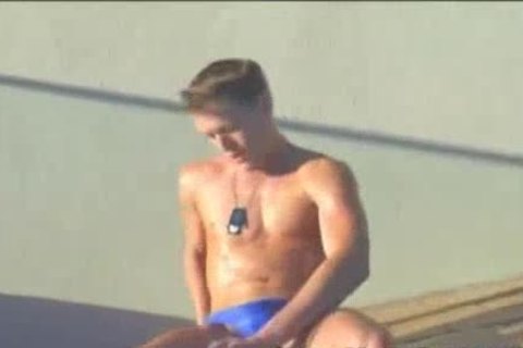 lewd Blond Model In Speedos