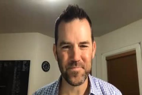 older man stroking On web camera